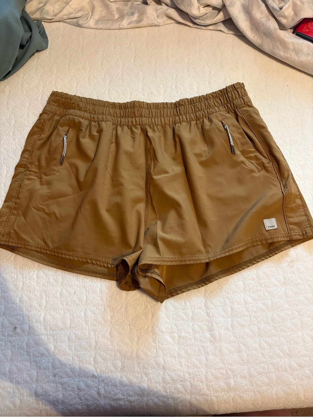 Vuori Women's Athletic Shorts in Brown